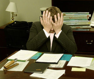 Frustrated man at a desk